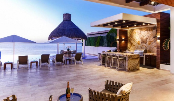 Ultra Exclusive Beachfront Villa Just Steps from the Sand with Butler Included