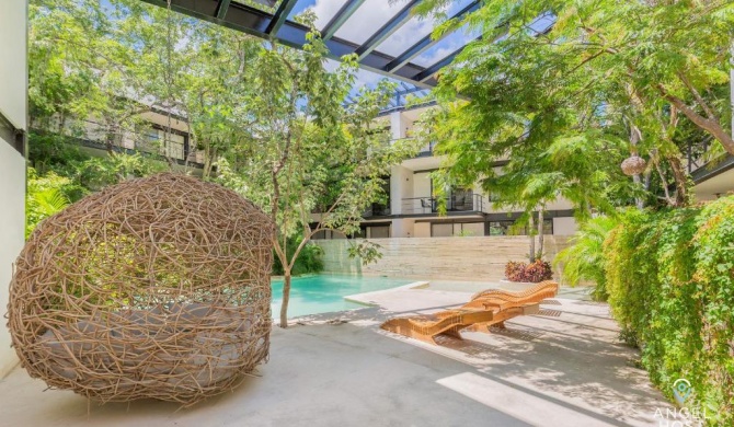 Naturally soothing condos in a jungle setting with pool onsite