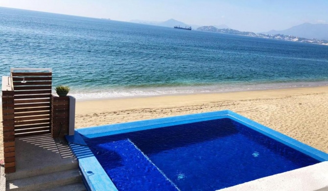 INCREIBLE DEPARTAMENTO A PIE DE PLAYA EN MANZANILLO, COMPLETAMENTE NUEVO